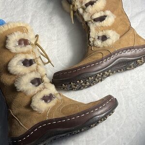 The North Face Tan and Cream Winter Boots with snowflakes
